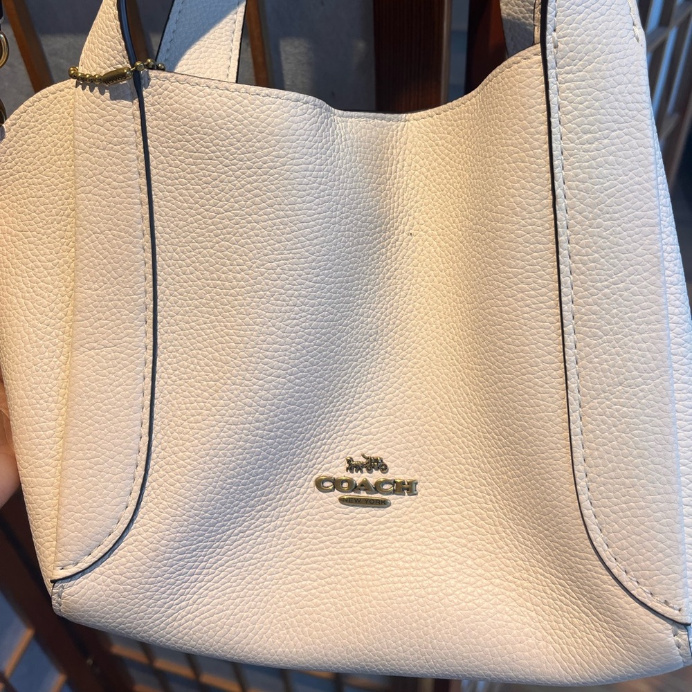 Off-white coach bag.